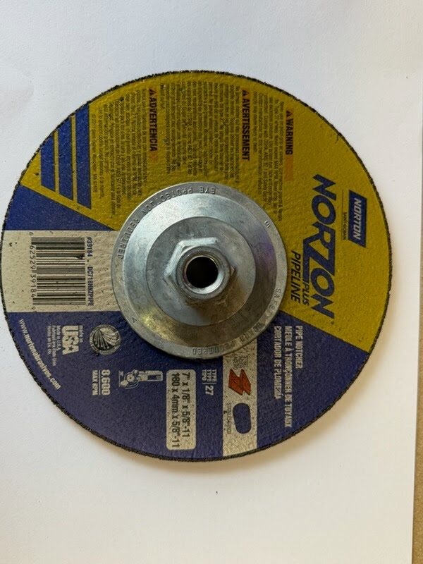 Norton NorZon Plus 7 inch by 1/8 inch by 5/8-11 Type 27 depressed center grinding wheel, 24 grit, MPN 66252939184